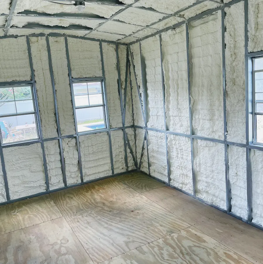 Closed-cell spray foam insulation applied to wall cavities in a residential project in Litchfield
